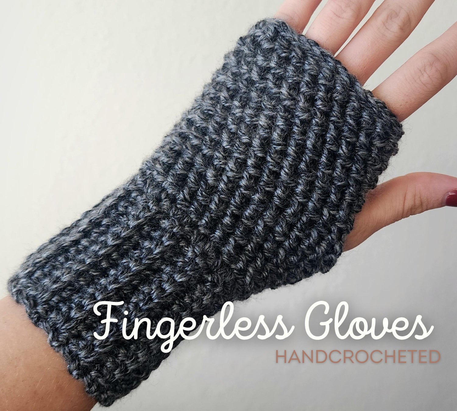 Hand-crocheted fingerless gloves in Charcoal Grey, showing open fingers for texting and typing.